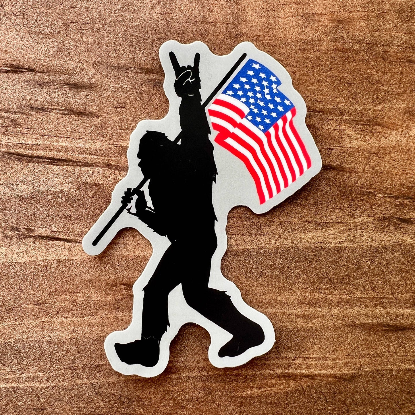 Bigfoot Carrying Flag Sticker 142